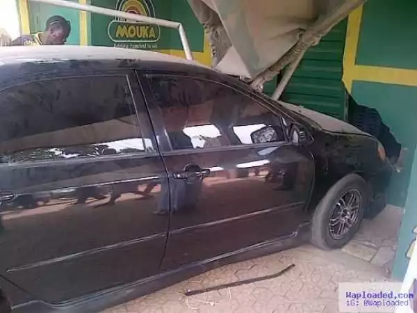 Photos: Car Loses Control And Slams Into Shops At Ikorodu, Lagos